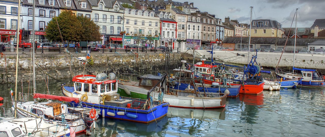 image of harbour with houses in background